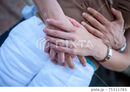 Loving couple holding hands close-up. Love concept 75311783