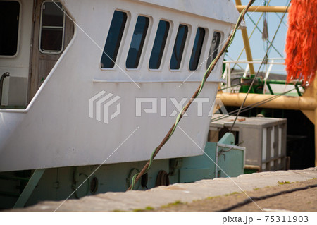 fishing boat stands in port, maritime transport theme fishing boat stands in port, maritime transport theme 75311903