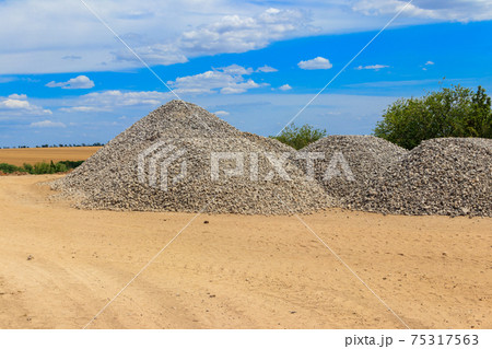 Piles of gravel for road construction 75317563