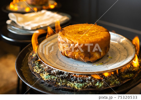 Shah's pilaf. Khan's pilaf in lavash in Azerbaijani in the restaurant. Traditional Oriental dish Shah's pilaf. Khan's pilaf in lavash in Azerbaijani in the restaurant. Traditional Oriental dish 75320533