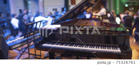 the piano on stage in the spotlight. the piano on stage in the spotlight. 75326761