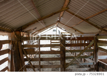 Inside of a barn on a farm Inside of a barn on a farm 75328901