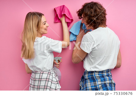 friendly young family do household chores together, cleaning concept friendly young family do household chores together, cleaning concept 75330676