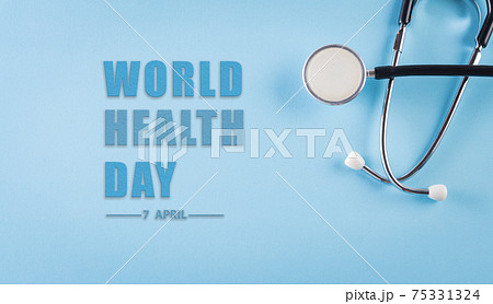World health day, Healthcare and medical concept. Stethoscope on pastel blue background with the text. World health day, Healthcare and medical concept. Stethoscope on pastel blue background with the text. 75331324
