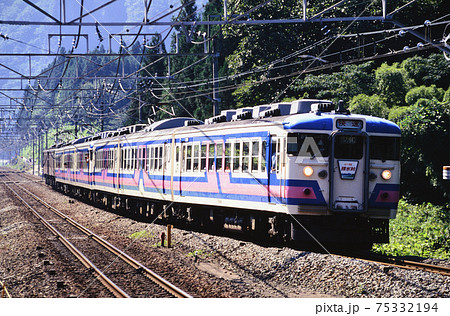 1997年 旧信越本線を行く169系ホリデー快速碓氷峠の写真素材