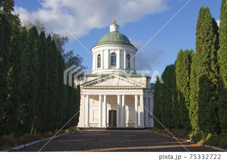 All Saints church in Nizhyn, Chernihivska oblast, Ukraine. Beautiful old building XVIII century with dome for religious purposes, Orthodox Church. Ukrainian baroque architecture. Shady alley. Scenery. All Saints church in Nizhyn, Chernihivska oblast, Ukraine. Beautiful old building XVIII century with dome for religious purposes, Orthodox Church. Ukrainian baroque architecture. Shady alley. Scenery. 75332722