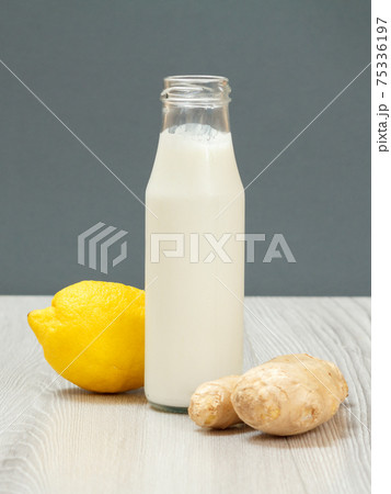 Health remedy relief foods for cold and flu on a gray wood boards. Health remedy relief foods for cold and flu on a gray wood boards. 75336197