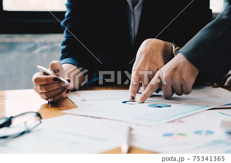Close up Business people meeting to discuss the situation on the market. Business Financial Concept 75341365