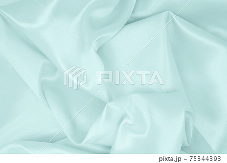 Smooth elegant blue silk or satin luxury cloth texture as abstract background. Luxurious background design 75344393