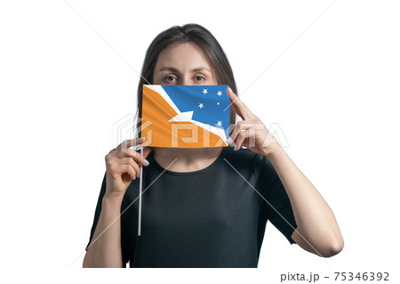 Happy young white woman holding flag Argentine Antarctica flag and covers her face with it isolated on a white background Happy young white woman holding flag Argentine Antarctica flag and covers her face with it isolated on a white background 75346392