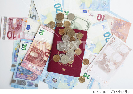 Cash on table isolated: dollars, euro, rubl broken money. All in mess, global crisis . passport travel concept Cash on table isolated: dollars, euro, rubl broken money. All in mess, global crisis . passport travel concept 75346499