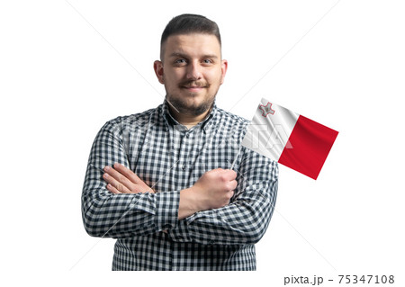 White guy holding a flag of Malta smiling confident with crossed arms isolated on a white background 75347108