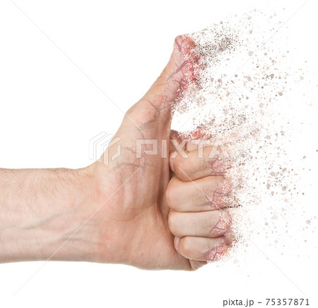 Dispersing hand showing thumb up Dispersing hand showing thumb up 75357871