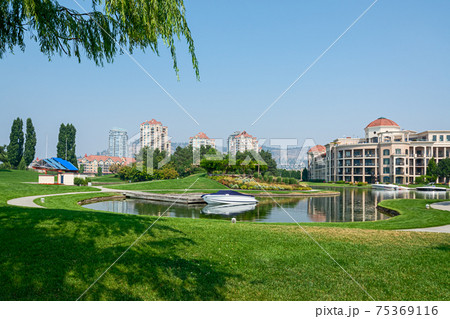 Luxury residential buildings with water channel at front 75369116