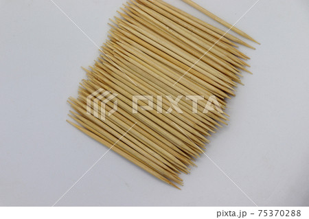 bamboo created toothpick on white background bamboo created toothpick on white background 75370288