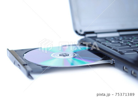 Laptop with a disk Laptop with a disk 75371389