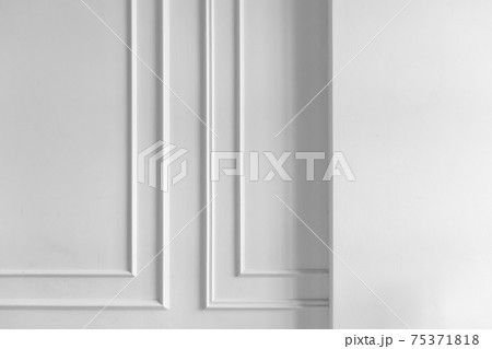 White wall with niche and decorative frame elements White wall with niche and decorative frame elements 75371818