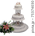 Whites Wedding Cake with Lily flower isolated on white background 75374030