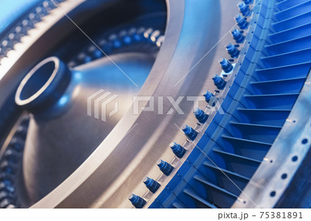 Turbine generator rotor with blades and discs, interior view. Turbine generator rotor with blades and discs, interior view. 75381891