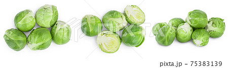 Brussels sprouts and half isolated on white background with clipping path and full depth of field. Set or collection 75383139