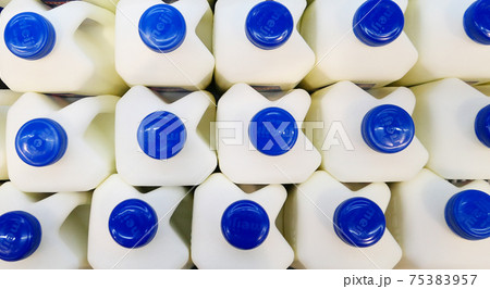 Bottles with milk 75383957