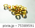 Fish oil capsules on a light background 75389591