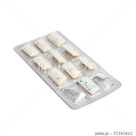 rectangular pieces of gum in a blister pack on a white background rectangular pieces of gum in a blister pack on a white background 75391622