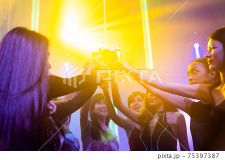 Young people celebrating a party, drink and dance Young people celebrating a party, drink and dance 75397387