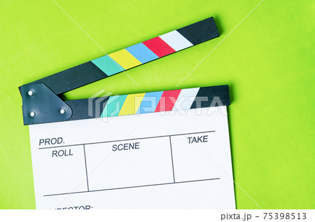 Clapperboard on green background Clapperboard on green background 75398513