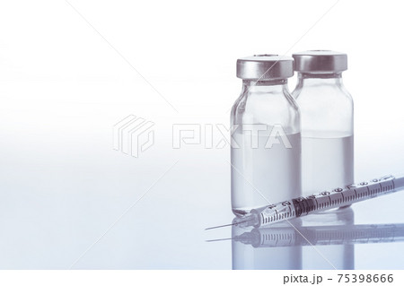 syringe and medicine bottle 75398666