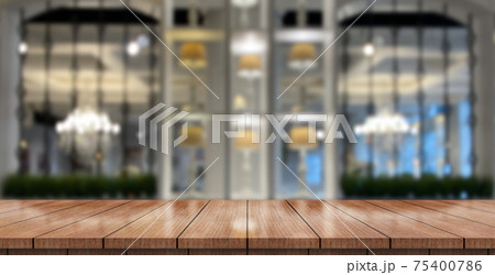 Empty wooden table top with lights bokeh on blur restaurant background 75400786