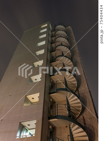 Night view of apartment building, Kanazawa, Japan. 75404434