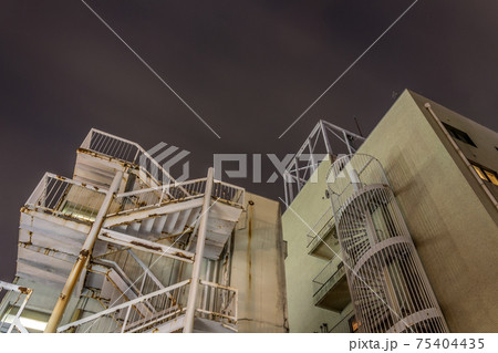 Night view of apartment building, Kanazawa, Japan. 75404435