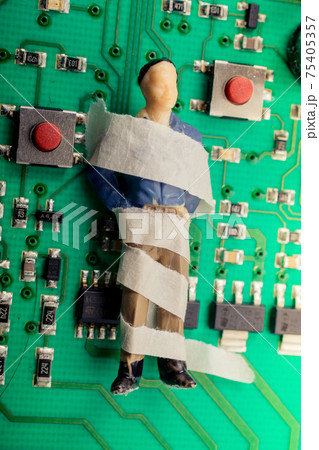 Tiny figurine of man model  wrapped in bandages 75405357