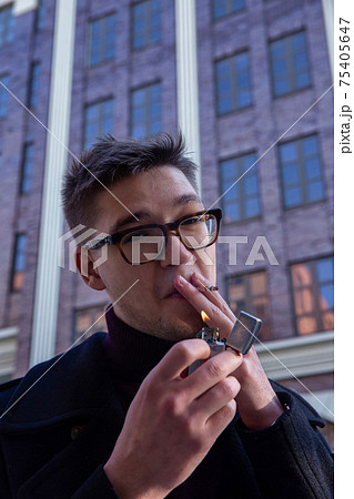 White european young man building behind White european young man building behind 75405647