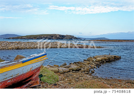 Dilapidated Greek boat in the Aegean Sea Dilapidated Greek boat in the Aegean Sea 75408618