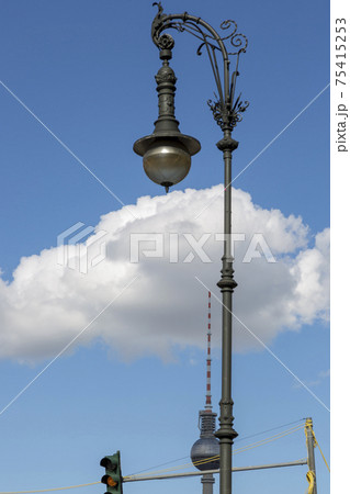 Lamp post against the background of a television tower on a street in Berlin Lamp post against the background of a television tower on a street in Berlin 75415253