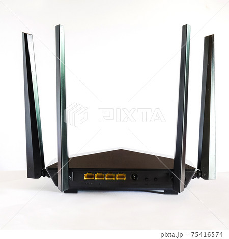 Wireless Wi-Fi router isolated on white. router wireless AC. Wireless Wi-Fi router isolated on white. router wireless AC. 75416574