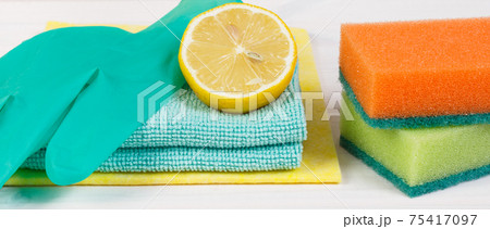 Lemon with accessories using at home for cleaning, household duties 75417097