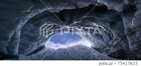 Beautiful View of the Ice Cave in the Alpines 75417623
