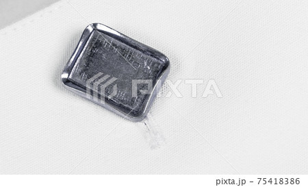 Cufflink on a white shirt 75418386