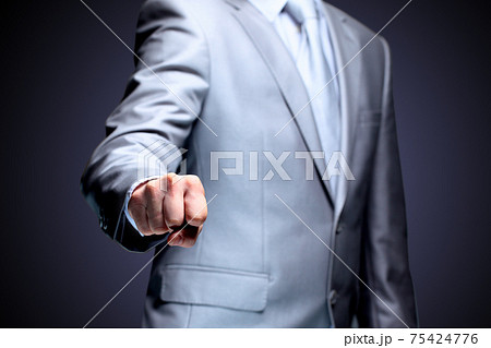 The businessman, a gesture, a finger. The businessman, a gesture, a finger. 75424776