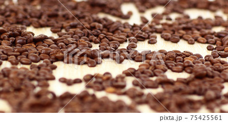 Natural grain of coffee. 75425561