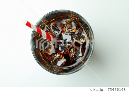 Glass of cola with ice cubes and straw on white background 75426143