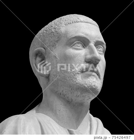 Head detail of the ancient man sculpture. Stone face isolated on black background. Antique marble statue of mythical character 75426497