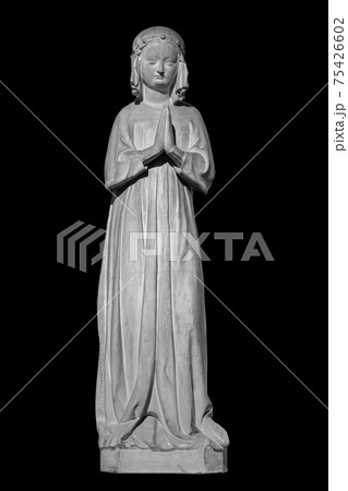 Face of statue of grieving woman isolated on black background. Plaster antique sculpture of young woman. Gypsum copy 75426602