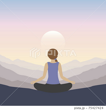 girl makes yoga on mountain landscape at sunset 75427424