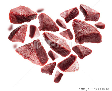 Pieces of fresh meat in the shape of a heart on a white background 75431038