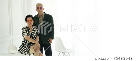 Asian senior elder hipster couple wearing stylish fashion winter dress white background copy space 75435948