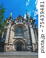 Cityscape with old towers of Greek Catholic Church 75439481